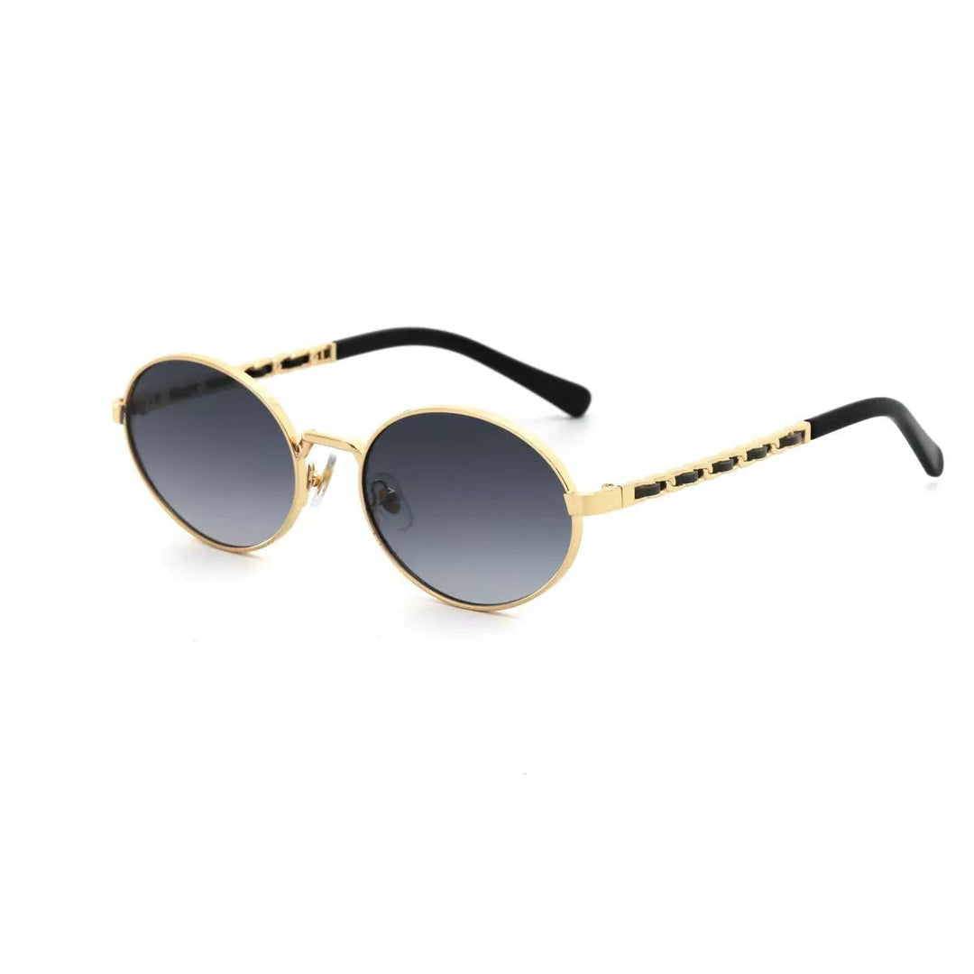 Dame elegant rund solbrille med luksuriøs ramme og komfortable stenger Skanto