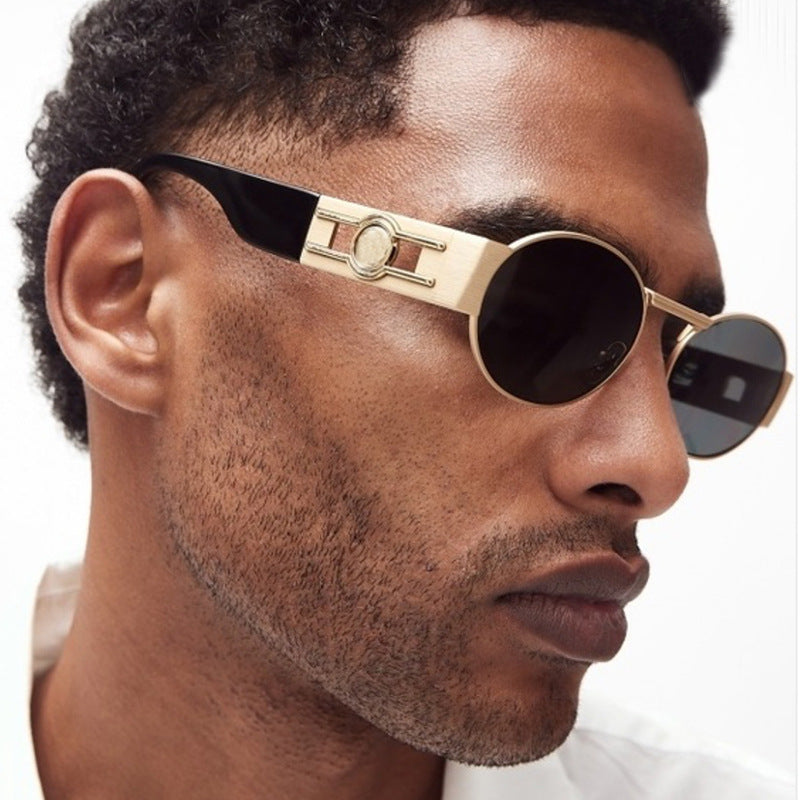 Dame rund solbrille med moderne metallramme og UV-beskyttelse Skanto