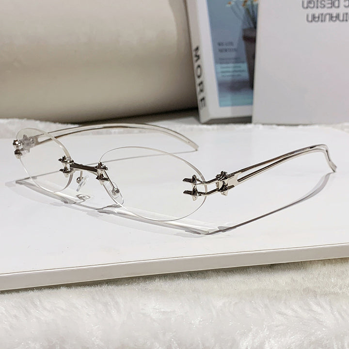 Dame elegant metallbrille med filigran design Skanto