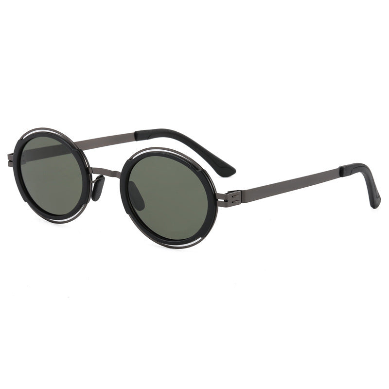 Damer moteriktig rund solbrille med elegant metallramme Skanto