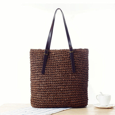 Handbag made of handmade natural material with sturdy leather handles Skanto