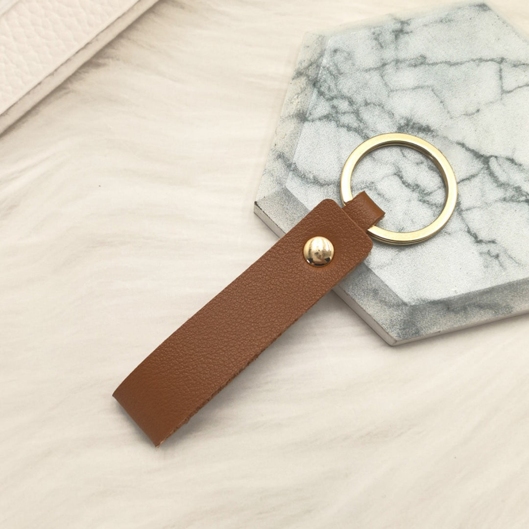 Unisex nøkkelring i høy kvalitet av kunstskinn med stiløs design Skanto
