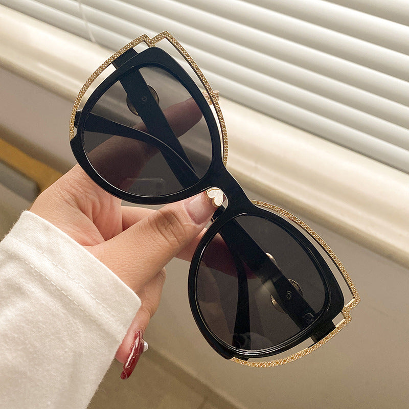 Dame Cat-Eye solbriller med glitrende detalj Skanto