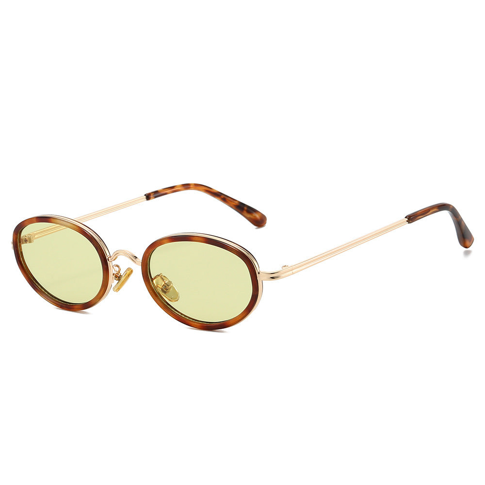 Dame moteriktig solbrille med høy kvalitet ramme og runde glass Skanto