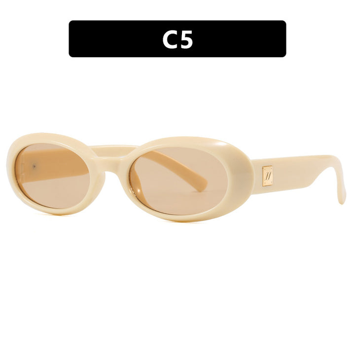 Dame eksklusiv solbrille i elegant ovalt design Skanto