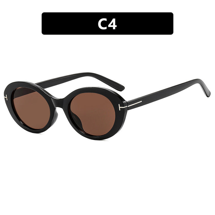 Dame moteriktig solbrille med innovativ oval ramme og UV-beskyttelse Skanto