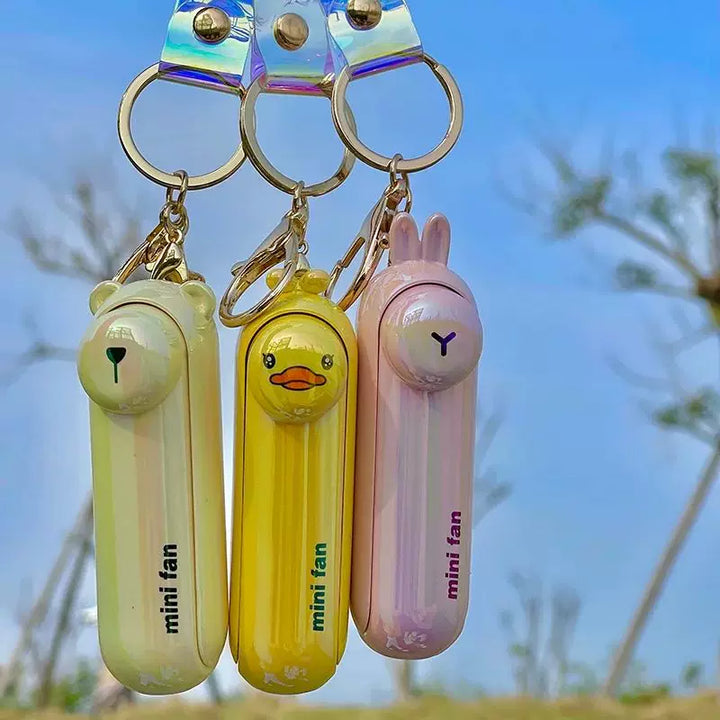 Unisex enhetsstørrelse oppladbar nøkkelring håndholdt mini-vifte med håndleddsstropp og ny art frosk charm Skanto