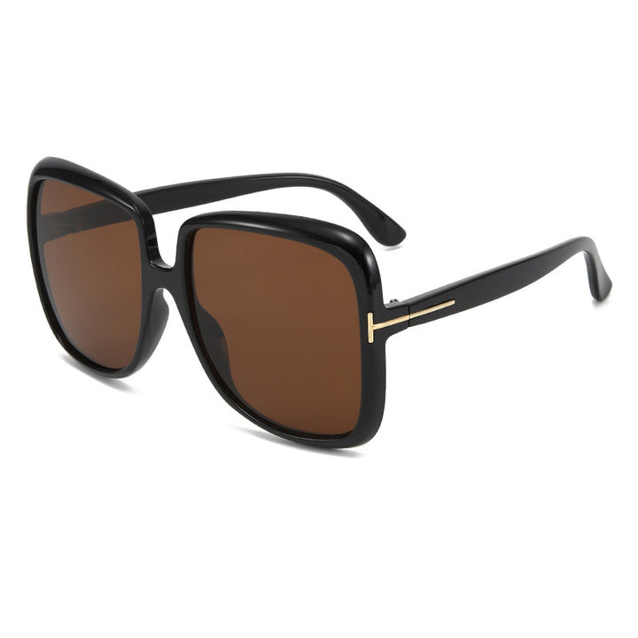 Dame elegant oversized solbrille med filigranramme Skanto