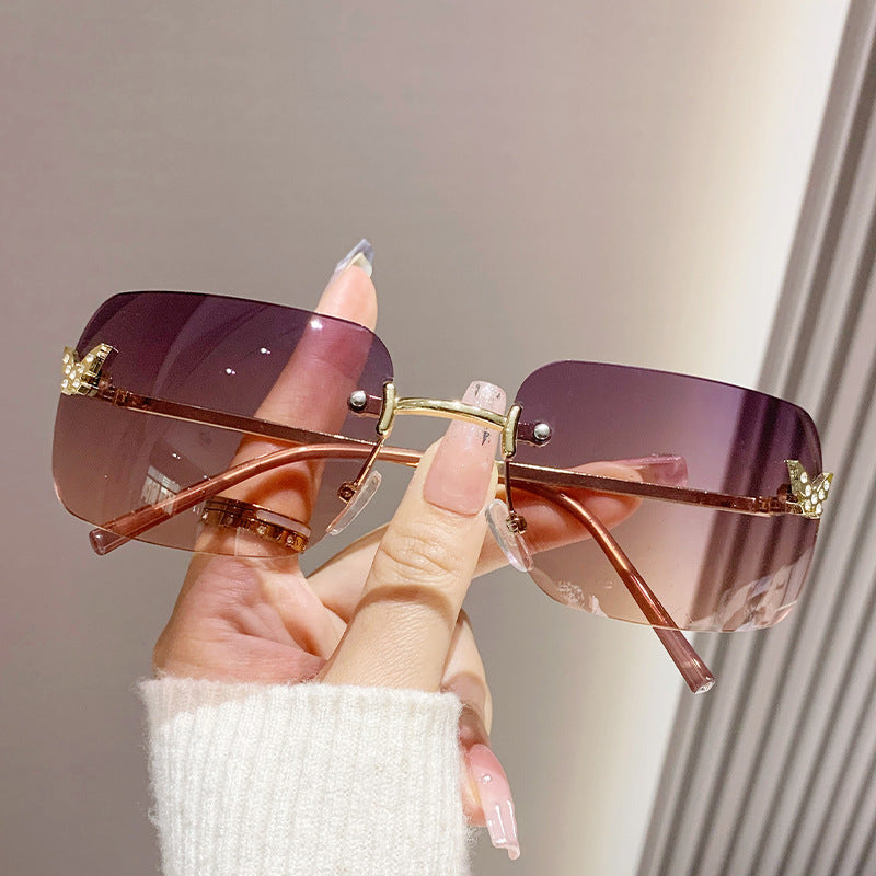 Dame elegant oversized solbriller med vevd gullramme Skanto