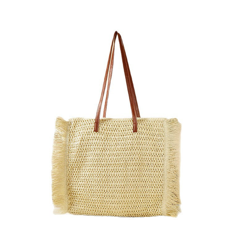 Strandveske i raffia med frynse-detaljer Skanto