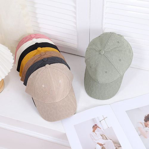 Kvinnens teksturerte motebaseballcaps Skanto