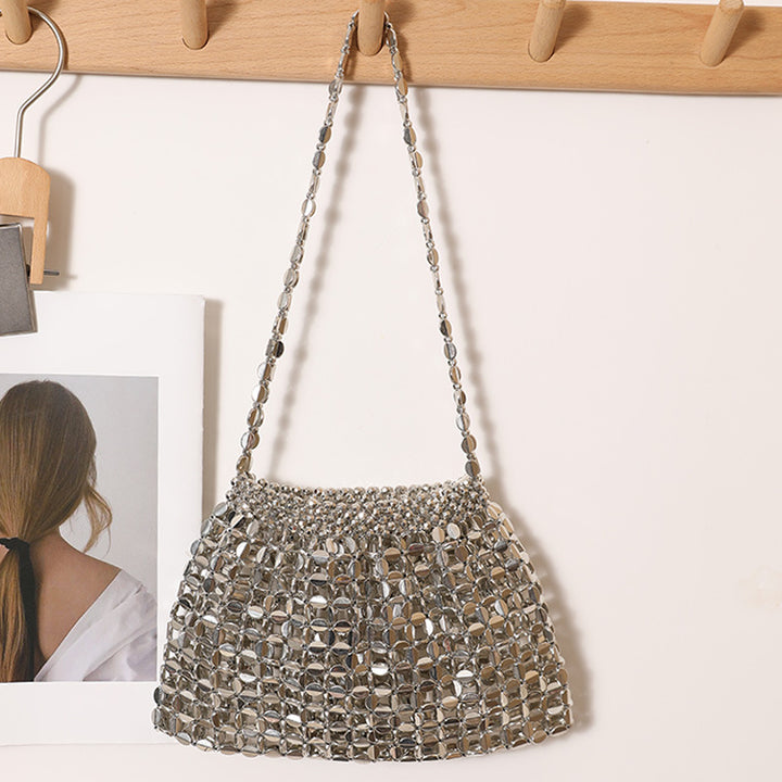 Moderne skulderveske i glitrende design Skanto