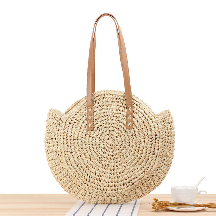 Round straw bag with leather handle Skanto