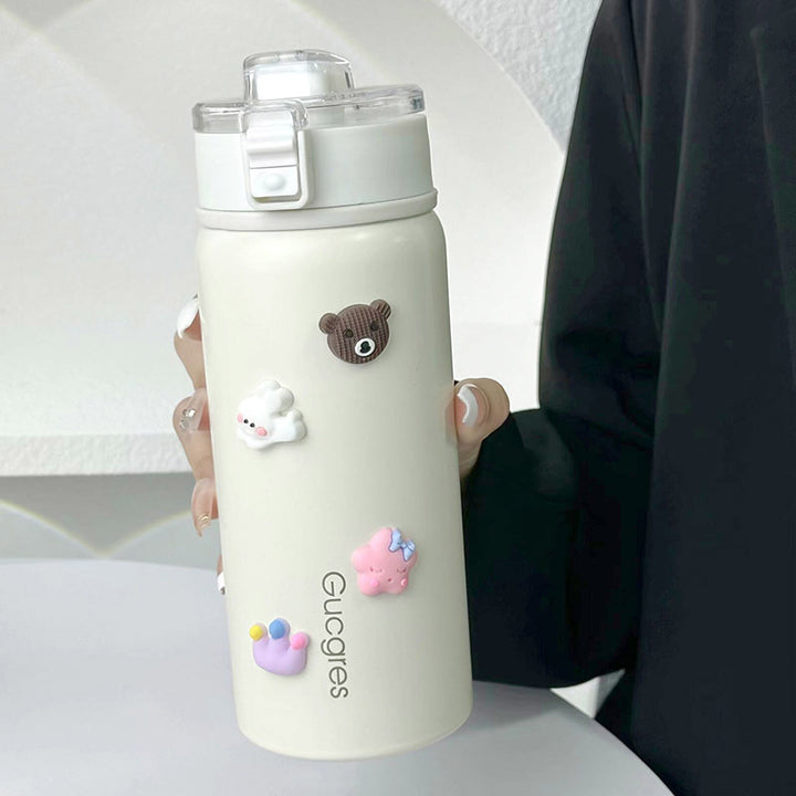 Dame isolerende drikkeflaske med sikker klaffelokk og leken design Skanto