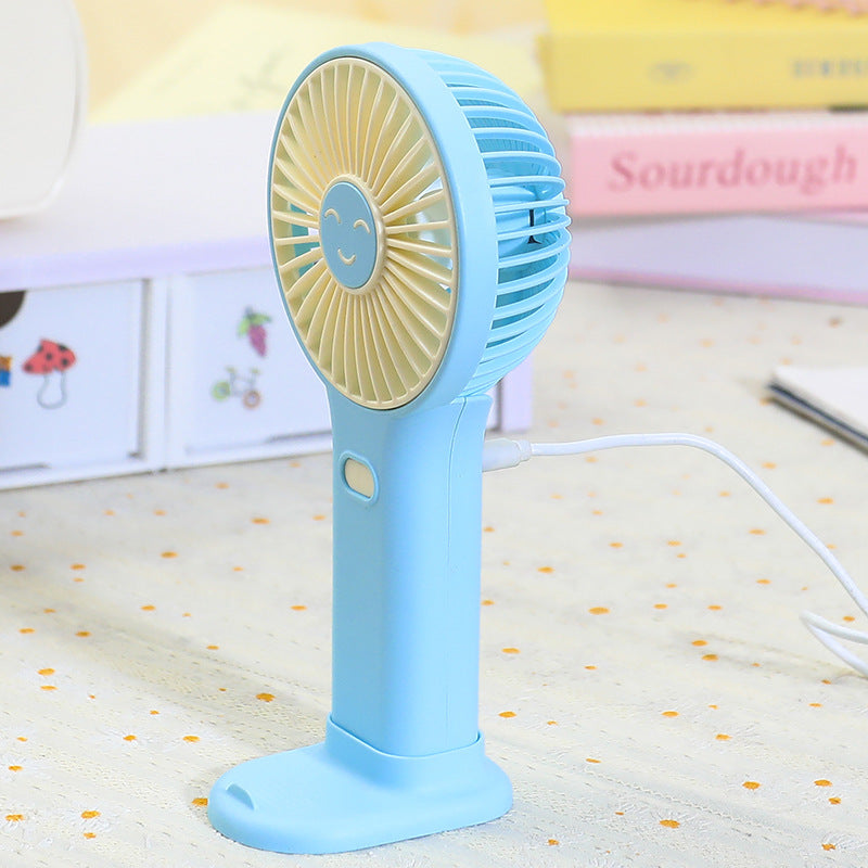 Dame Bærbar Håndvifte med smilende ansikt og USB-ladingsfunksjon Skanto