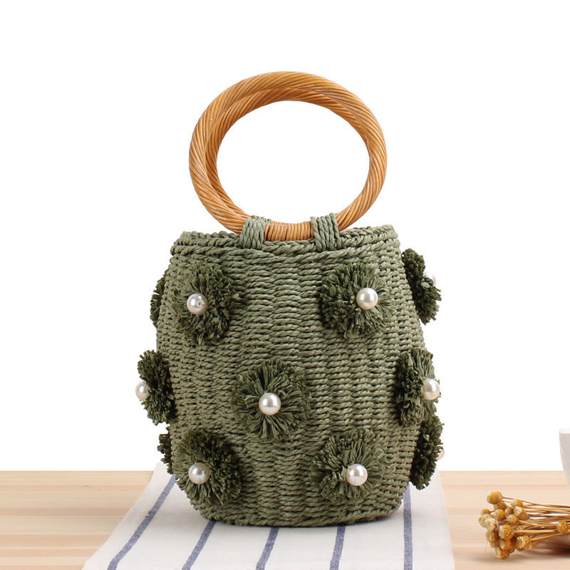 Handbag with unique pearl embellishments Skanto