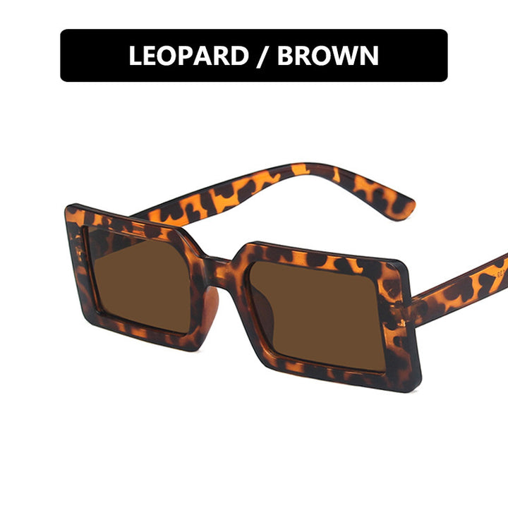 Dame kvadratisk solbrille med moderne, bred ramme og beskyttende UV-filter Skanto