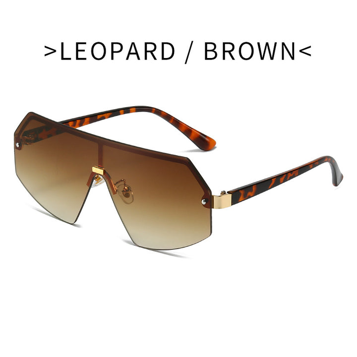 Dame futuristisk oversized solbrille med innovativ ramme Skanto