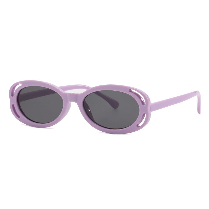 Damen modische solbrille med oval ramme og unikt design Skanto