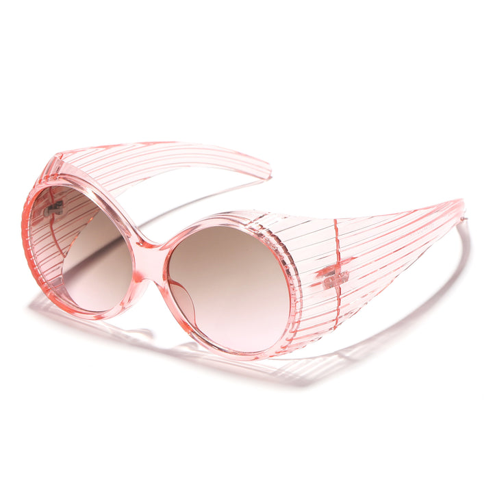 Damer trendy og iørefallende solbriller med moderne design Skanto