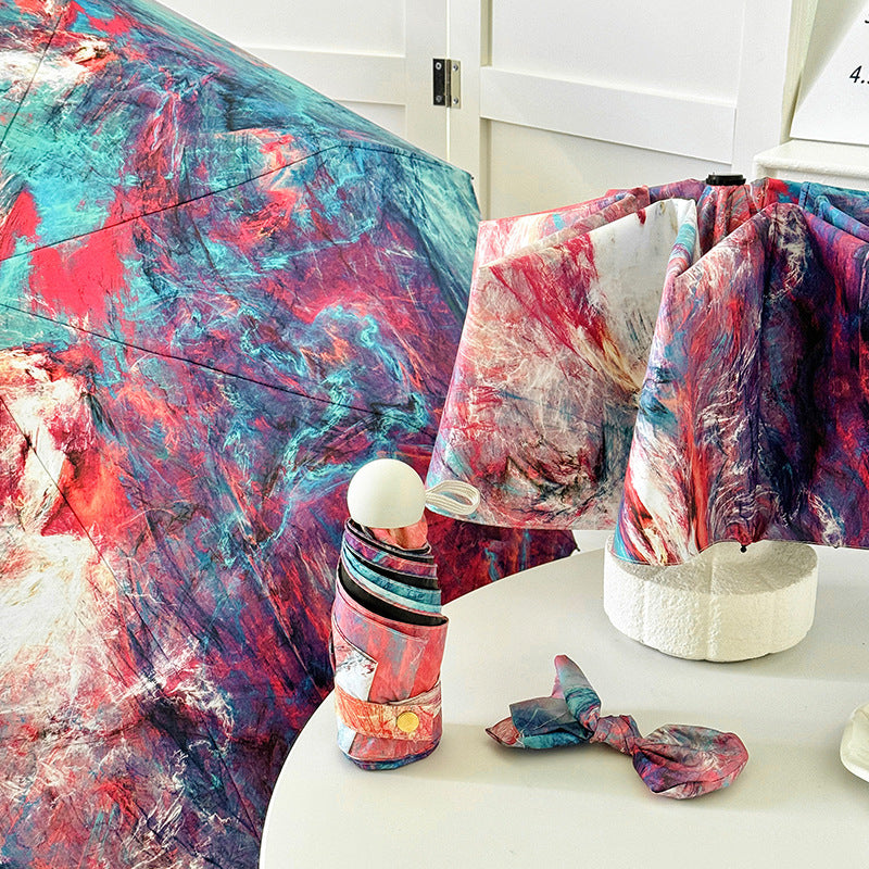 Dame sammenleggbart paraply med kreativt kunstdesign Skanto