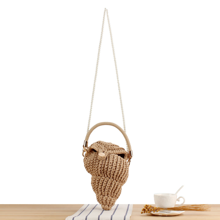 Elegant håndveske i muslingdesign Skanto