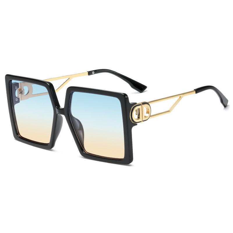 Dame oversized firkantet solbrille med elegant metallramme og polariserte glass Skanto