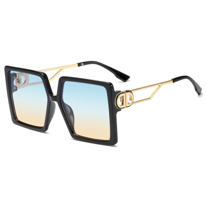 Dame oversized firkantet solbrille med elegant metallramme og polariserte glass Skanto