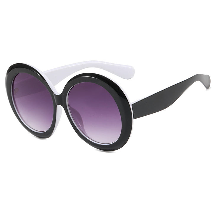 Dame oversized moteriktig solbrille med elegant design Skanto