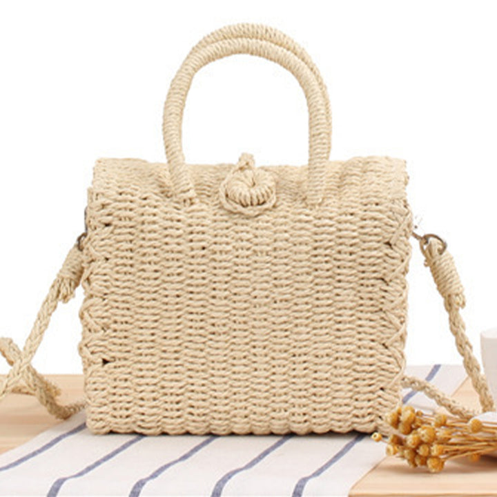 Woven natural material handbag with practical shoulder strap Skanto
