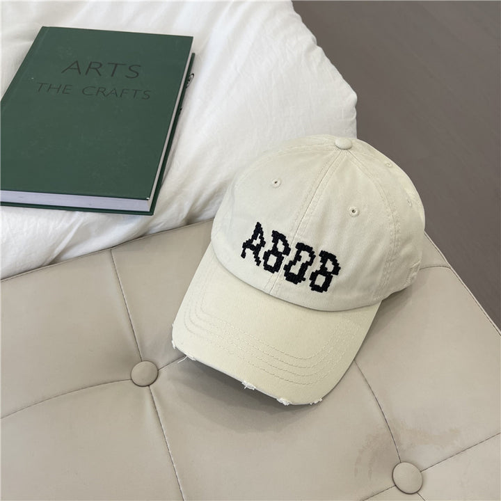 Kvinnens slitte bomull baseballcaps med grafisk detaljer Skanto