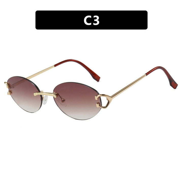 Dame elegant ovalformet solbrille med moderne metalramme Skanto