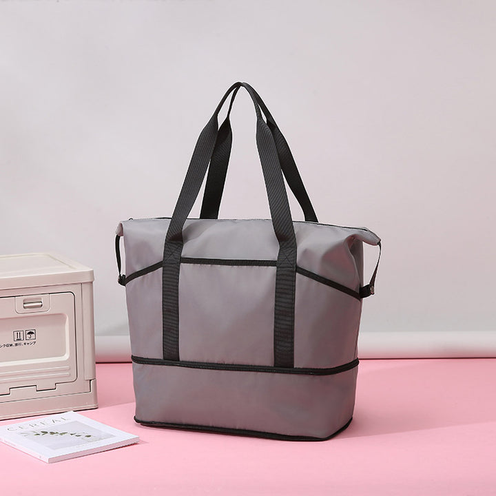 Romslig og funksjonell handlebag Skanto