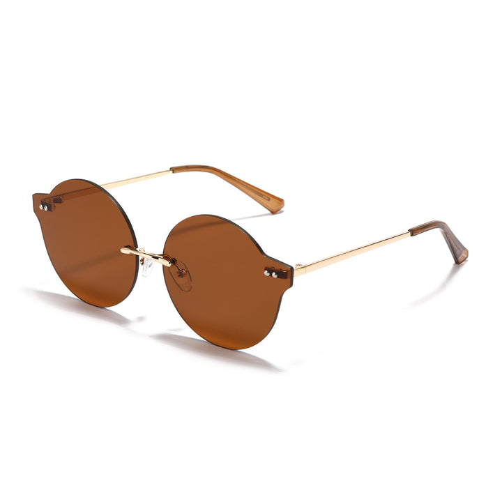 Dame solbrille i unikt, elegant design Skanto