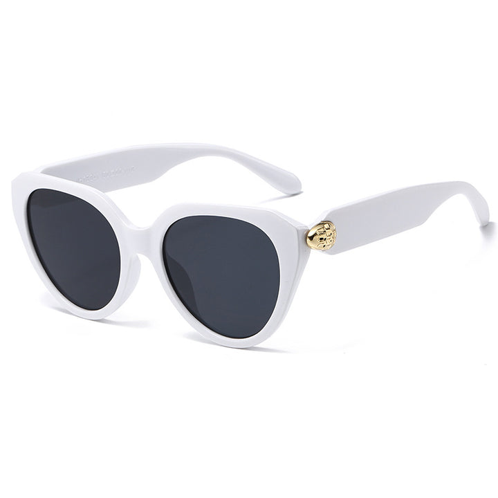 Dame Cat-Eye solbriller med gullige detaljer og beskyttende UV-filter Skanto