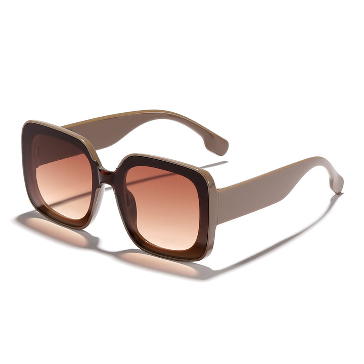 Dame firkantet solbrille med innovativt transparent rammedesign Skanto