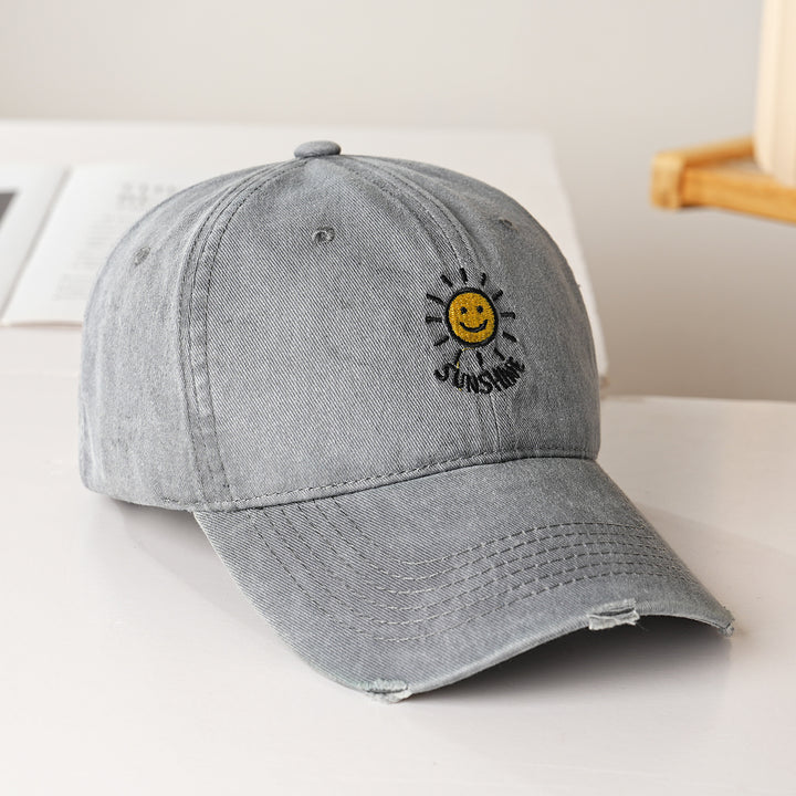 Dame sporty bomullslue med solbroderi Skanto