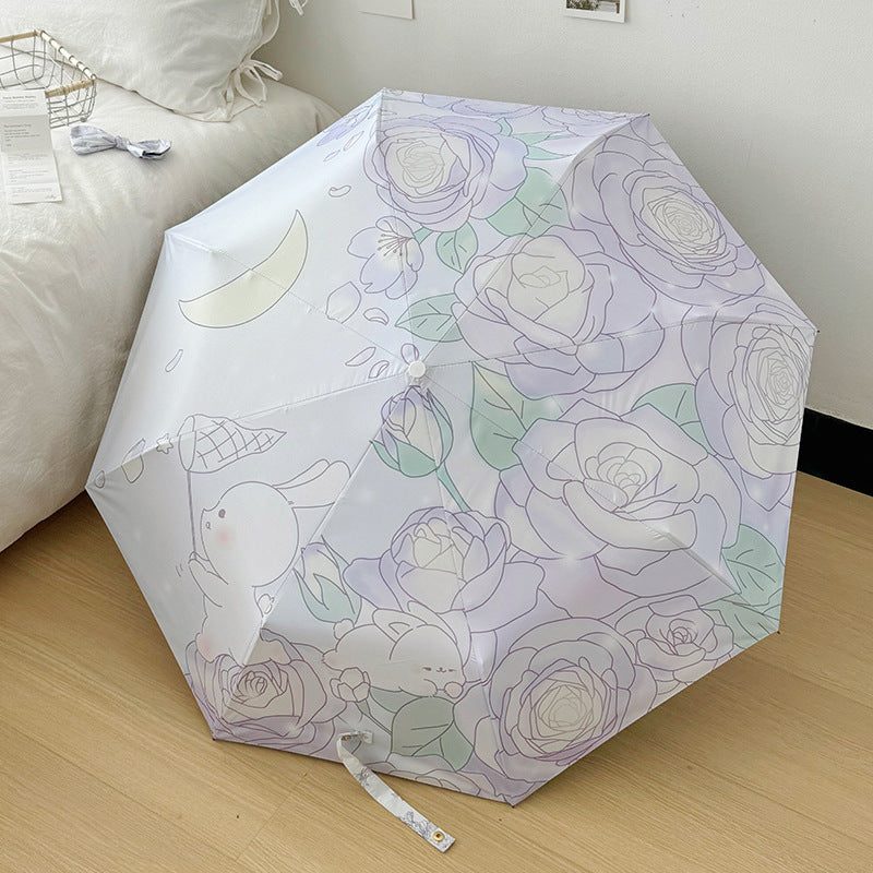 Dame sammenleggbart paraply med blomsterminalisme Skanto