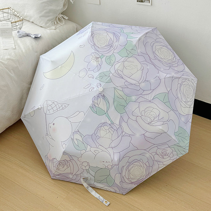 Dame sammenleggbart paraply med blomsterminalisme Skanto