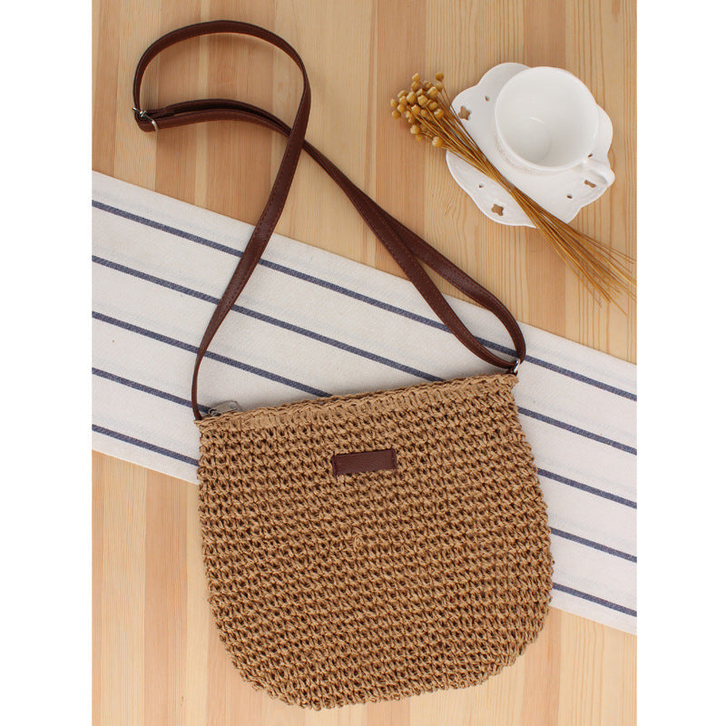 Shoulder bag in woven natural material with detachable leather strap Skanto