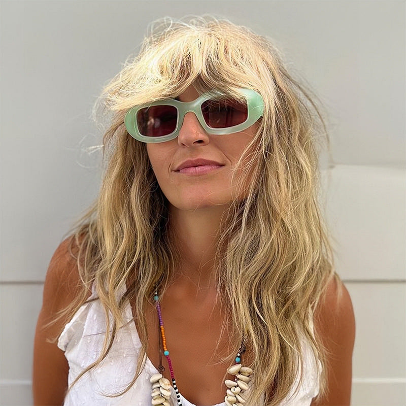 Dame Modisk solbrille med myk, buet ramme Skanto