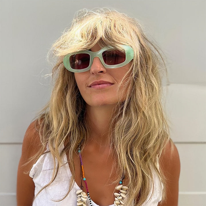 Dame Modisk solbrille med myk, buet ramme Skanto