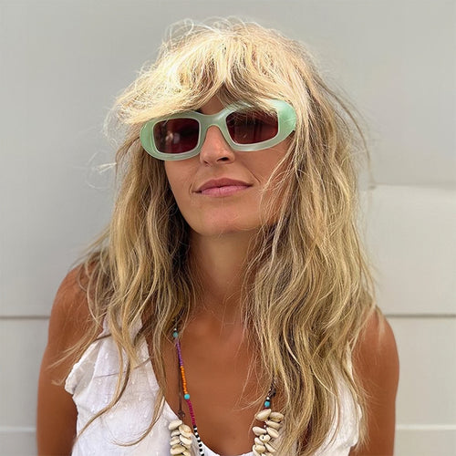 Dame Modisk solbrille med myk, buet ramme Skanto