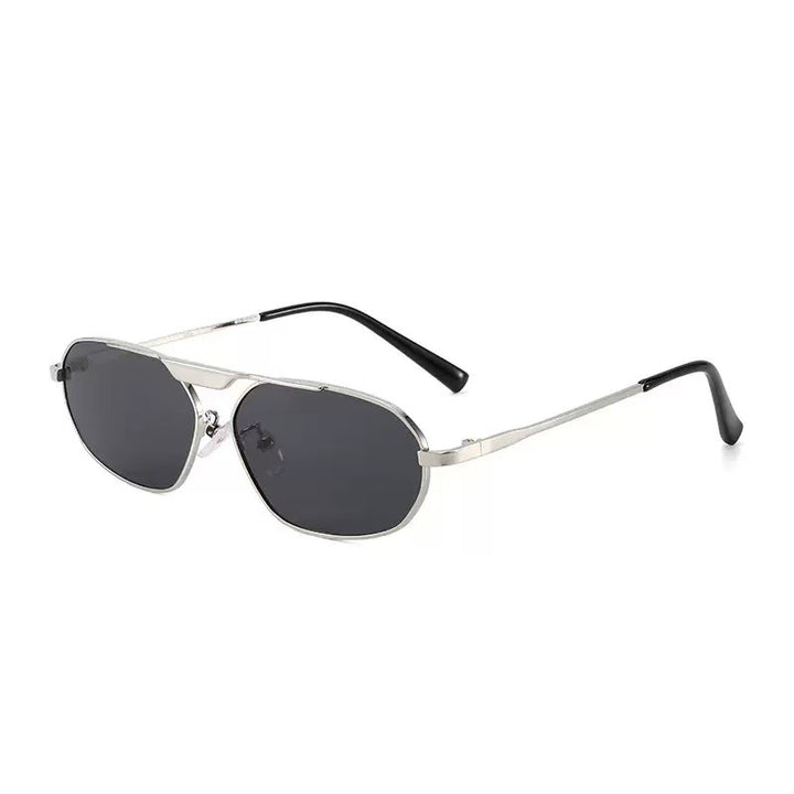 Dame moteriktig solbrille i elegant polygon-design Skanto