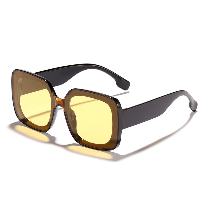 Dame firkantet solbrille med innovativt transparent rammedesign Skanto
