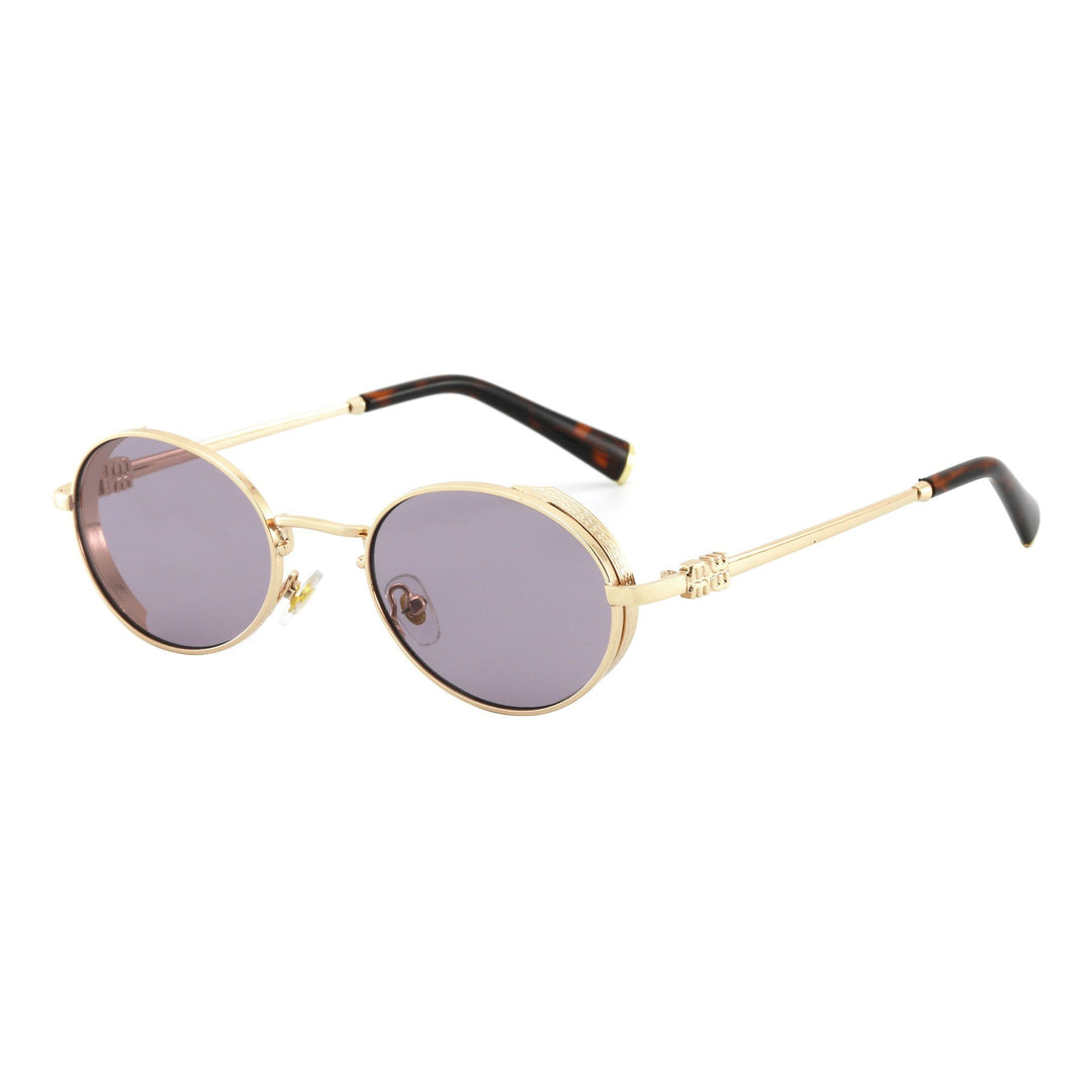 Dame Runde Designer-solbrille med elegant metallramme Skanto