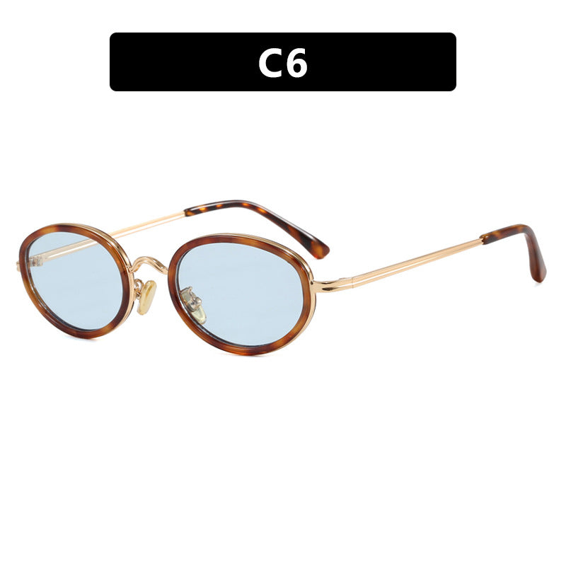 Dame elegant rund solbrille med moderne metallramme Skanto