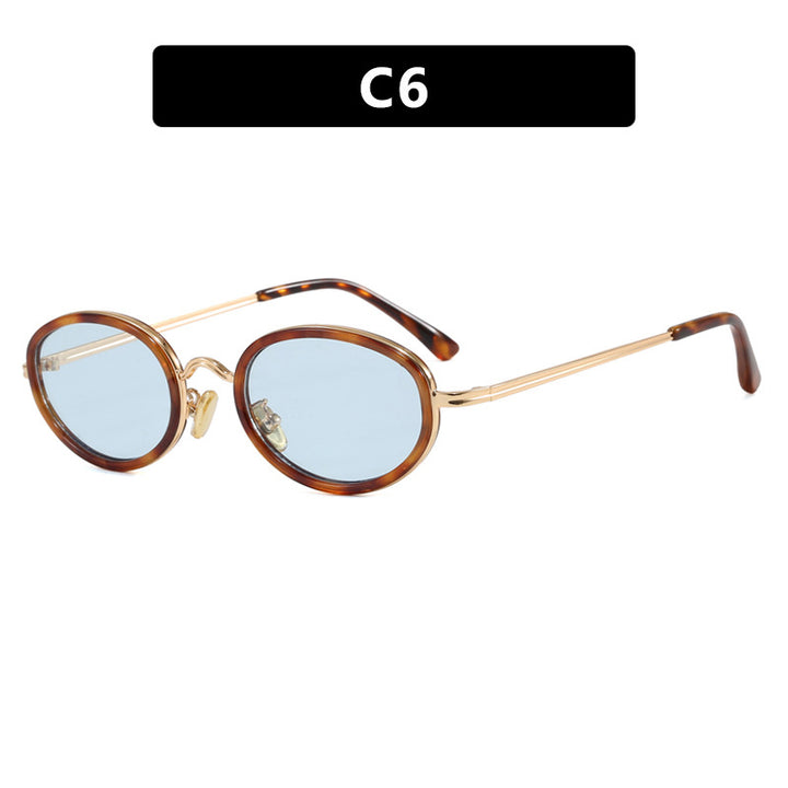 Dame elegant rund solbrille med moderne metallramme Skanto