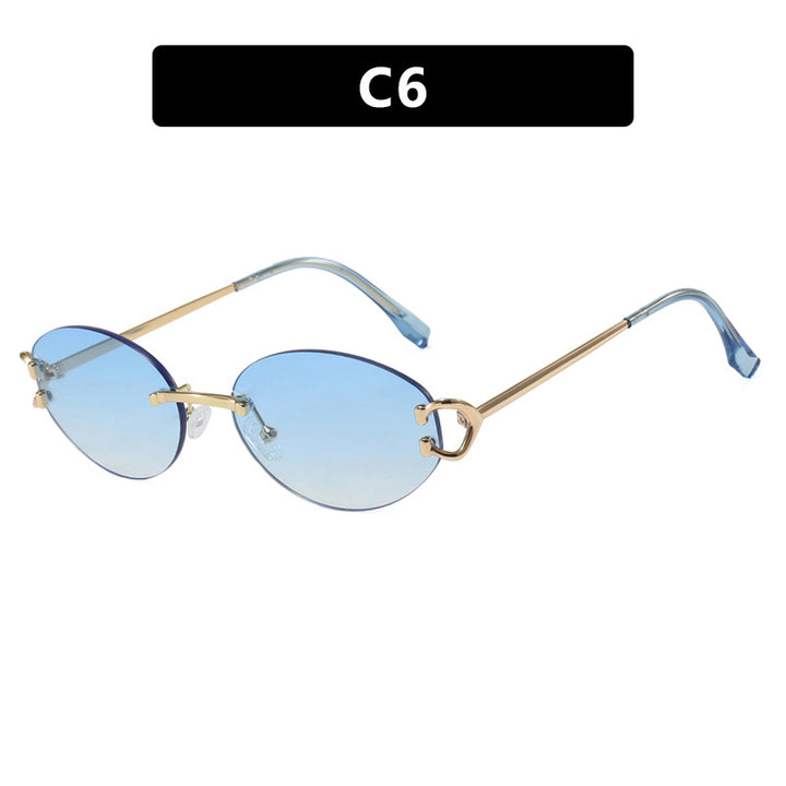 Dame elegant ovalformet solbrille med moderne metalramme Skanto
