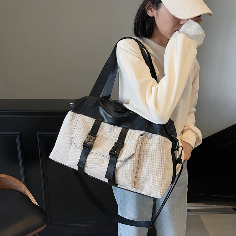 Praktisk multifunksjons duffelbag med robust design og intelligent romlayout Skanto